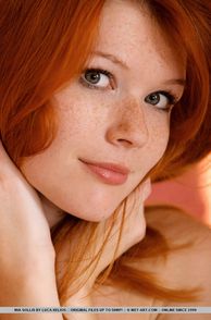 Pretty Freckled Face Redhead Girl