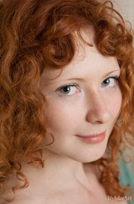 Pretty Eyes With Curly Red Hair